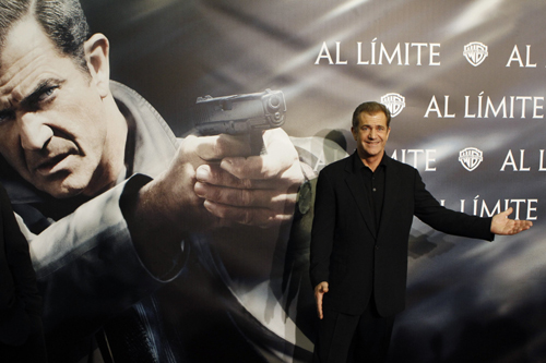 Actor Mel Gibson poses during the Spanish premiere of the film Edge of Darkness in Madrid February 1, 2010.