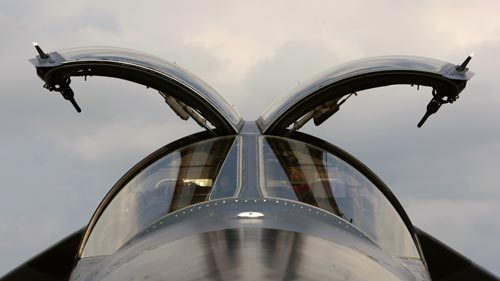 The opened cockpit canopy of a Royal Australian Air Force (RAAF) F-111 Aardvark jet is pictured at the static display area of the Singapore Airshow February 2, 2010. The RAAF will be retiring their F-111s in 2010. 