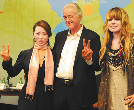 Chinese singer Cheng Lin (L), guitar legend Jimmy Page (M), Michael Jackson's guitarist Orianthi at the press conference in Beijing.