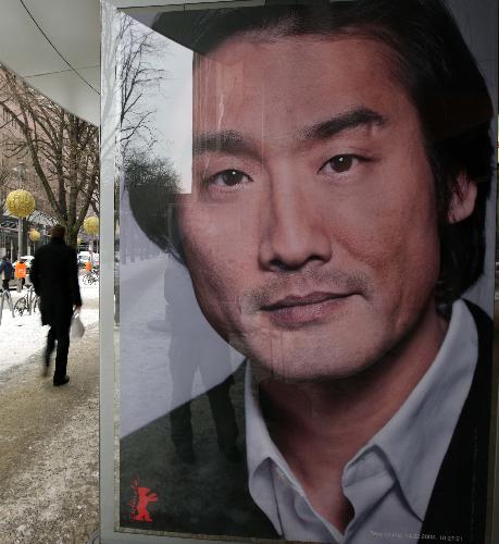 A poster of Hong Kong movie actor Tony Leung Ka Fai is seen on a street in Berlin, capital of Germany, Feburary 2, 2010. The 60th Berlin International Film Festival (Berlinale) will kick off in Berlin on Feburary 11.