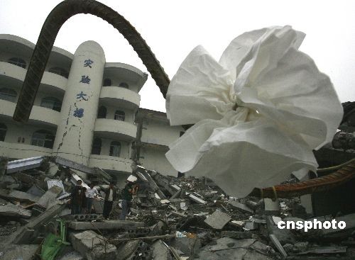 In this photo taken on May 17, 2008, the old Juyuan High School was reduced to rubble by the Sichuan earthquake on May 12, 2008. Among the 2,800 students at school that day, 278 died and 11 were missing.