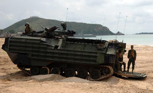 Soldiers in an armored vehicle take part in a landing drill of the Cobra Gold multinational military exercise in Sattahipp of Changwat Chon Bury, Thailand, Feb. 4, 2010.[Shi Xianzhen/Xinhua] 