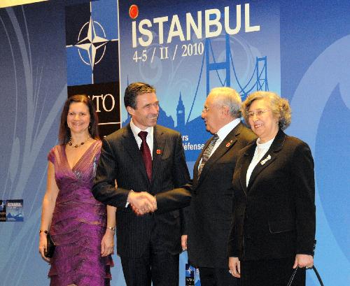 NATO Secretary General Anders Fogh Rasmussen (2nd L), shakes hands with Turkish National Defense Minister Vecdi Gonul (2nd R) during the informal meeting of NATO defense ministers in Istanbul, Turkey, Feb. 4, 2010. NATO defence ministers started a two-day session in Istanbul on Thursday dedicated to reviewing operations in Afghanistan and finding ways to solve a one-billion-dollar shortfall for 2010. [Chen Ming/Xinhua] 