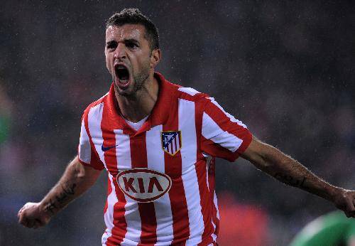 Atletico Madrid's Simao Sabrosa celebrates his goal during their King's Cup semi-final first leg soccer match against Racing Santander in Madrid, Spain, February 4, 2010. Atletico Madrid won the match 4-0. (Xinhua/Chen Haitong)