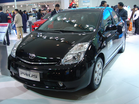 A Toyota Prius hybrid displayed in an auto show. Toyota Motor Corp. spokeswoman Ririko Takeuchi said Thursday that Toyota discovered there were design problems with the antilock brake system and corrected them for Prius models sold since late January, including those being shipped overseas.