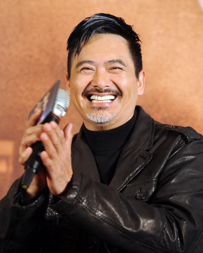 Cast member Chow Yun-fat gestures at a press conference of the movie 'Confucius' in Taipei, southeast China's Taiwan Province, Feb. 3, 2010.