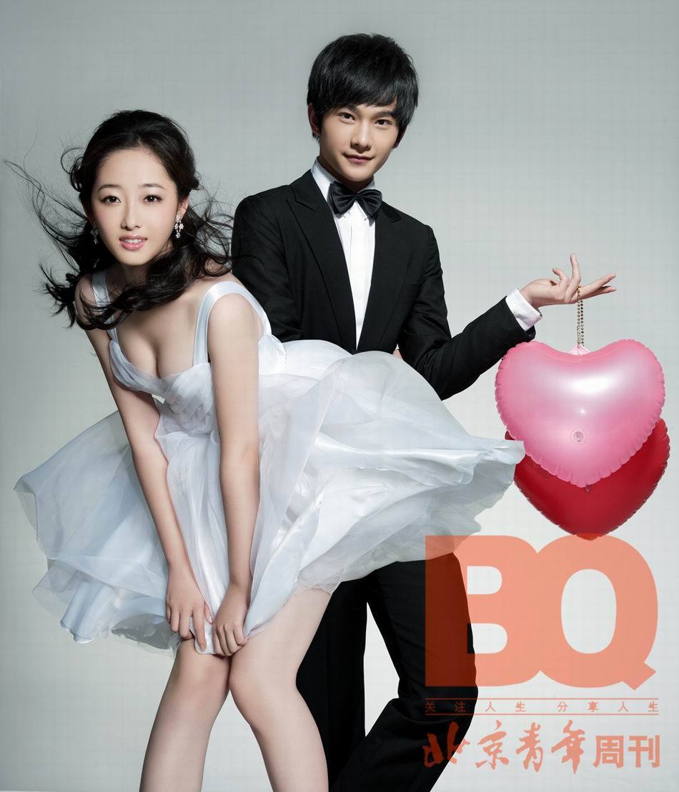 Leading actor Yang Yang (R) and actress Jiang Mengjie pose for a fashion magazine in Beijing