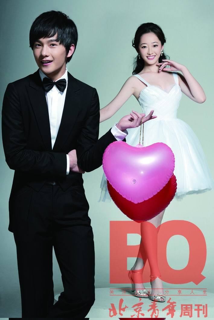 Leading actor Yang Yang (L) and actress Jiang Mengjie pose for a fashion magazine in Beijing