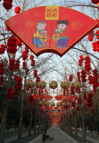 Photo taken on February 4, 2010 shows the vista of alameda decorated with full range of florid red lanterns inside the Ditan (Altar of the Earth) Park, as the festival atmosphere for the 25th Spring Festival Temple Fair slated from February 13 to 20, at Ditan Park is drumming up, in Beijing. 