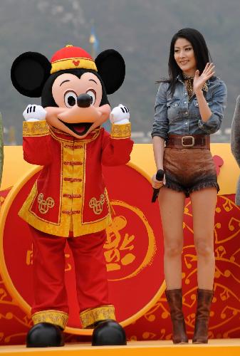 Entertainer Kelly Chen attends a performance to celebrate the upcoming Spring Festival at Disneyland in south China's Hong Kong Feb. 4, 2010. This Spring Festival, the Chinese New Year by the lunar calendar, falls on Feb. 14. 2010. 