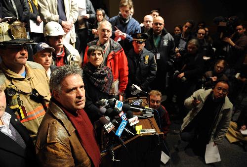 Sebastian Giuliano (L in front), mayor of Middletown, speaks during a news conference following an explosion at the Kleen Energy plant in Middletown, Connecticut, Feb. 7, 2010.[Xinhua] 