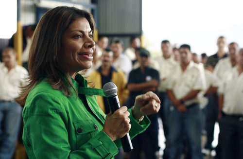 File photo shows Laura Chinchilla, presidential candidate for the National Liberation Party, talks to bus drivers during a campaign meeting in San Jose November 20, 2009. The front-runner in Costa Rica&apos;s 2010 presidential vote says she will try to seal free trade deals with China, the European Union and Singapore if she replaces President Oscar Arias, whose pro-trade agenda split the Central American nation. Picture taken November 20, 2009. [Xinhua/Reuters File Photo] 