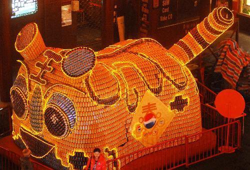 Photo taken on February 7, 2010 shows the elaborately-wrought festooned lantern of Shengxiao Tiger in trial lighting, during the trial illumination of the 2010 Shanghai Yuyuan Garden New Spring Folklore Artistic Lanterns Fair, in downtown Shanghai. [Xinhua photo]