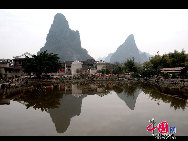 Huangtao is a famous town with a history of about 900 years, lying in Shaoping County, Guangxi Zhuang Autonomous Region. The village covers about 3.6 square kilometers. In Huangtao, there are well-preserved buildings from the Ming Dynasty (1368-1644) and Qing Dynasty (1644-1911). [Photo by Sheng Hongxu]