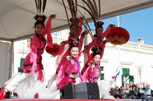 Performers dance during the 4th Valletta Chinese Spring Festival Gala Show in Valletta, Malta on February 8, 2010 to mark the forthcoming Chinese festival. [Xinhua photo]