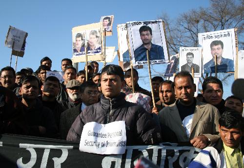 Journalists and professionals attend a protest rally against the murder of media person Jamim Shah who was shot dead on Sunday in Kathmandu, capital of Nepal, Feb. 10, 2010. [Bimal Gautam/Xinhua]