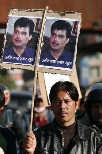 Journalists and professionals attend a protest rally against the murder of media person Jamim Shah who was shot dead on Sunday in Kathmandu, capital of Nepal, Feb. 10, 2010. [Bimal Gautam/Xinhua] 