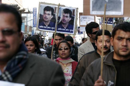 Journalists and professionals attend a protest rally against the murder of media person Jamim Shah who was shot dead on Sunday in Kathmandu, capital of Nepal, Feb. 10, 2010. [Bimal Gautam/Xinhua] 