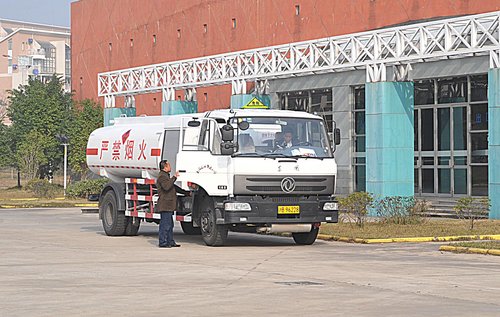 A refueling truck for the helicopter parks on a square in Fuzhou, capital of Fujian province on February 9, 2010.