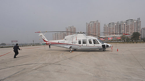 The helicopter parks on a square in Fuzhou of Fujian province on February 9, 2010.