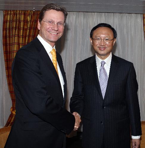 Chinese Foreign Minister Yang Jiechi (R) meets with his German counterpart Guido Westerwelle during the Munich Security Conference in Munich, Germany, Feb. 5, 2010. The three-day-long 46th Munich Security Conference opened here on Friday, with about 300 high-level officials covering themes from Afghanistan, Middle East stability to global energy security, arms control, world power shifting and NATO's new strategy. [Luo Huanhuan/Xinhua]