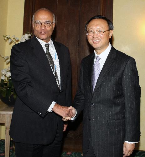 Chinese Foreign Minister Yang Jiechi (R) meets with Indian National Security Adviser Shivshankar Menon during the Munich Security Conference in Munich, Germany, Feb. 5, 2010. The three-day-long 46th Munich Security Conference opened here on Friday, with about 300 high-level officials covering themes from Afghanistan, Middle East stability to global energy security, arms control, world power shifting and NATO's new strategy. [Luo Huanhuan/Xinhua]