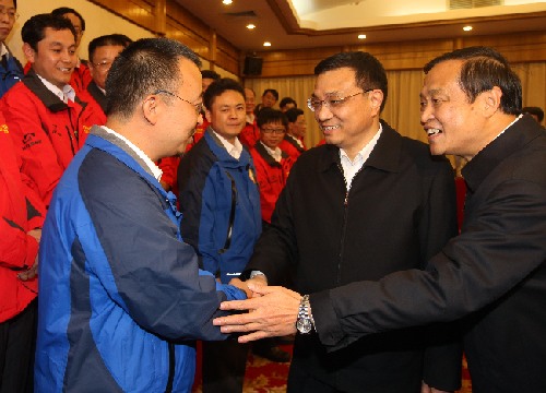 Chinese Vice Premiers Li Keqiang (front C) visits the State Oceanic Administration in Beijing, China, Feb. 11, 2010.