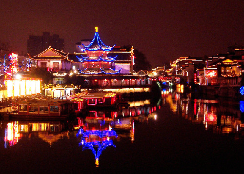 Photo taken on Feb. 11, 2010 shows the colorful night scene of the Confucian Temple in Nanjing Jiangsu Province. The 2010 Jiangsu Qinhuai Lantern Fair also known as the 24th Confucian Temple Spring Festival Lantern Fair was jointly launched by Chinese mainland and Taiwan in Nanjing on Thursday, two days before the Chinese Lunar New Year holiday. 