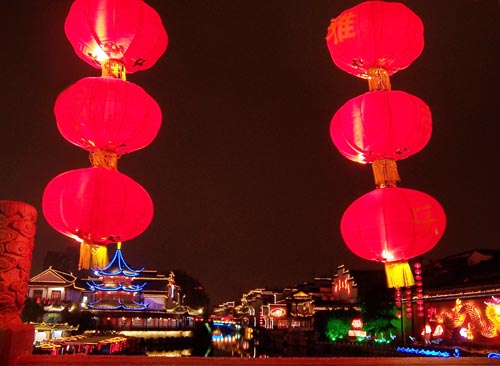 Photo taken on Feb. 11, 2010 shows the colorful night scene of the Confucian Temple in Nanjing, Jiangsu Province. The 2010 Jiangsu Qinhuai Lantern Fair also known as the 24th Confucian Temple Spring Festival Lantern Fair, kicked off in Nanjing on Thursday.