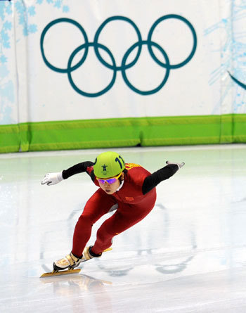 Wang Meng of China competes in the women's 500m heats of short track speed skating at the 2010 Winter Olympic Games in Vancouver, Canada, on February 13, 2010. Wang qualified after the heat. 