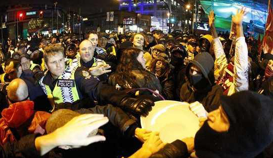 200 anti-Olympic protesters marched through downtown Vancouver on the first day of the 2010 Vancouver Winter Olympic Games on Saturday.