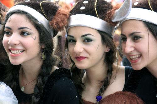 People attend a Grand Parade of the Limassol Carnival 2010 in the coastal city of Limassol, Cyprus, Feb. 14, 2010. (Xinhua/Wang Qiang)