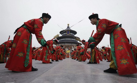 Actors take part in a performance, adapted from an ancient Qing Dynasty ceremony where emperors prayed for good harvest and fortune, at the Temple of Heaven in Beijing on the first day of the Chinese New Year February 14, 2010. The Chinese New Year began on Sunday and according to the Lunar calendar, it is the Year of the Tiger.[