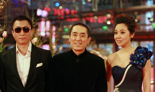 Chinese director Zhang Yimou (C), actor Sun Honglei (L) and actress Yan Ni arrives for the premiere of the film 'A Woman, a Gun and a Noodle Shop' at the 60th Berlinale International Film Festival in Berlin, Germany, Feb. 14, 2010.