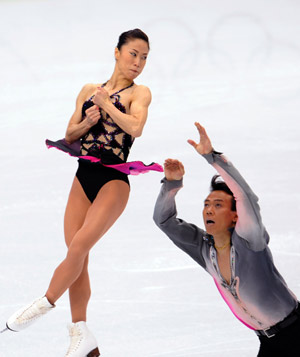 China's Shen Xue (L) /Zhao Hongbo perform in the pairs short program of figure skating at the 2010 Winter Olympic Games in Vancouver, Canada, on Feb. 14, 2010. 