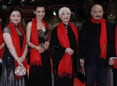 Actresses Jin Na (L), Monica Mo (2nd L), Lisa Lu (3rd L) and director Wang Quan'an arrive for the screening of the movie 'Tuan Yuan' (Apart Together) at the 60th Berlinale International Film Festival in Berlin February 11, 2010. 