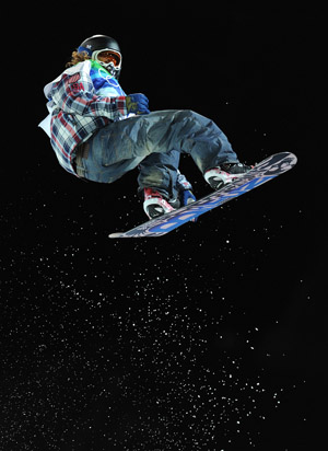Shaun White of the United States acts during the men's halfpipe final of snowboarding at the 2010 Winter Olympic Games in Vancouver, Canada, Feb. 17, 2010. Shaun White won the title of the event with 48.4 points.