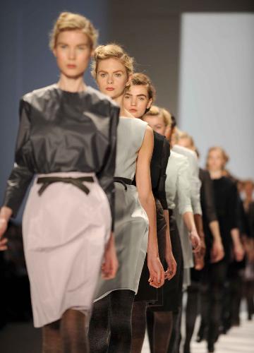 Models present creations of Trias during the Mercedes-Benz Fashion Week in New York, the United States, Feb. 18, 2010. 
