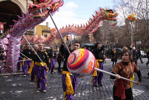 Italian students perform dragon dance during a parade celebrating the Chinese Spring Festival in Rome, Italy, Feb. 18, 2010. Chinese traditonal dragon dance and lion dance performed by Italian students won great popularity among the Italians. Many overseas Chinese and local residents attended the parade on Feb. 18. 