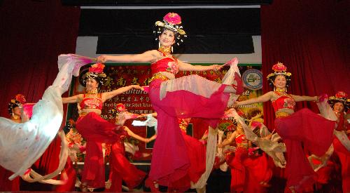 Actresses from the Overseas Chinese Union Art Troupe of Yunan Province perform during a celebration of the Chinese lunar New Year in Kota Kinabalu, capital of Malaysia's Sabah State, on Feb. 18, 2010. 