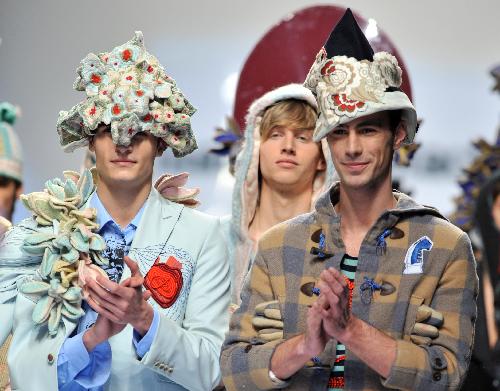 Models display creations of Spanish designer Isabel Mastache during the 51st Madrid Fashion Week in Madrid, capital of Spain, Feb. 18, 2010.[Xinhua]