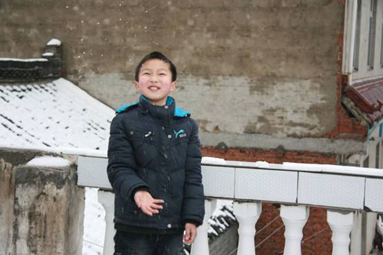 On the first day of Spring Festival, Huangqiao, a ancient town in Taixing county, north China&apos;s Jiangsu Province, welcomed its first snowfall since last winter. Although not as heavy as expected, the villagers were extraordinarily excited about it. It has usually been sunny on the first day of the lunar year for the last twenty years. [Elaine Duan/China.org.cn]