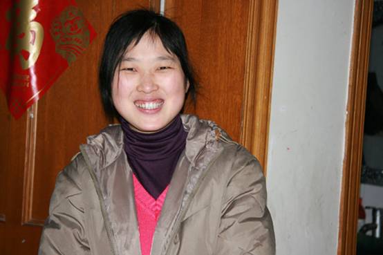 Xiaoxian, a bride joining a family clan this year, at a morning tea ceremony. [Elaine Duan/China.org.cn] 