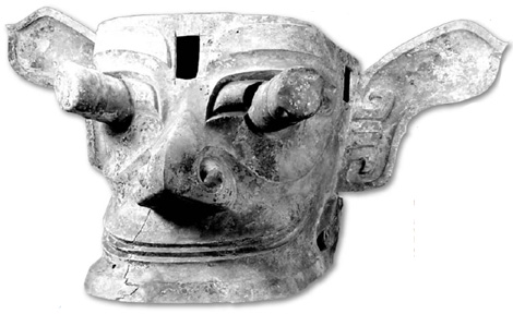 An iconic bronze mask found at Sanxingdui Ruins has protruding eyes, grinning mouth and pointed ears.(Photo: China Daily) 
