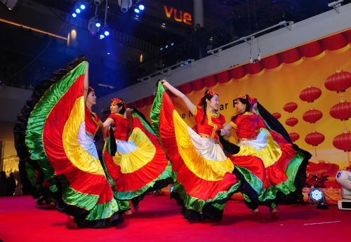 Performers from China dance during a Chinese New Year Fair at the Westfield Shopping Center in London, February 19, 2010. 