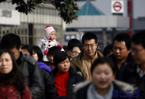 Passengers at the railway station in Shanghai on February 19, 2010.