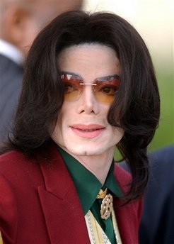 In this March 17, 2005 file photo, pop star Michael Jackson arrives at the Santa Barbara County Courthouse in Santa Maria, Calif.