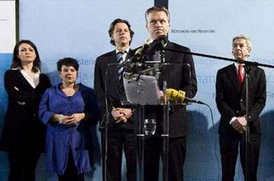 Netherlands' Finance Minister and Labour Party leader Wouter Bos, flanked by his party members, announces his party's withdrawal from Dutch Prime Minister Jan Peter Balkenende's three-party alliance in The Hague February 20, 2010. REUTERS/Stringer