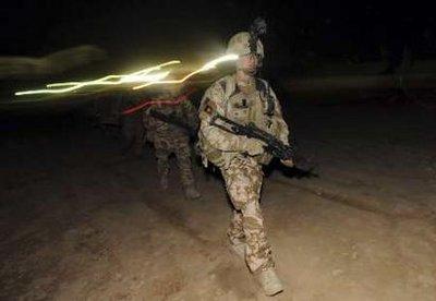 British soldiers from the First Battalion The Royal Welsh mobilise for Operation Moshtarak, a combined force of 15,000 troops launching major assaults on Taliban strongholds in Helmand Province, at Camp Bastion, Afghanistan February 13, 2010. A U.S.-led NATO force began a long-planned assault on the Taliban stronghold of Marjah in Afghanistan's southern Helmand province on Saturday.REUTERS/SSgt Will Craig