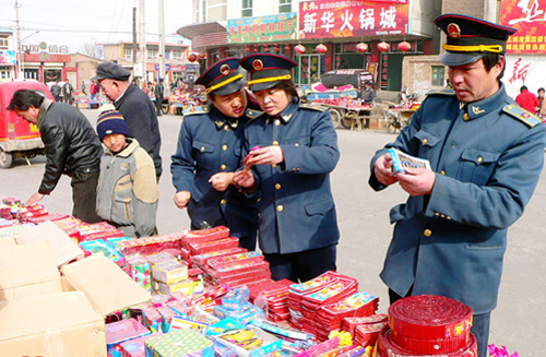 Law enforcement officials check a fireworks store in Jingyuan County, Gansu Province, ahead of Spring Festival. Thirty-five people were killed in 7,480 accidental fires that broke out around China during the Spring Festival holiday, the Ministry of Public Security said on February 20. 